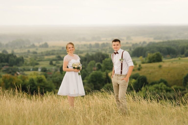 optimize-loving-couple-posing-against-beautiful-view-wedding-day-bride-groom.jpg